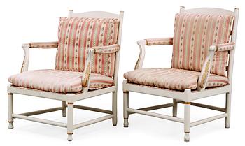 556. A Gustavian 18th Century armchair. Comprising one copy from the 19th Century.