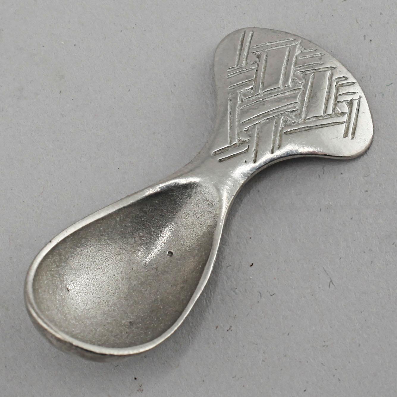 A "Kirun" salt bowl with spoon in pewter, made by Lars Pirak, second half of the 20th century.