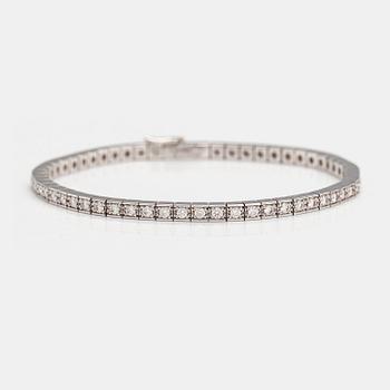 Cartier, "Lanieres", an 18K white gold bracelet with diamonds ca. 1.77 ct in total. Marked Cartier, OY8558, 16.