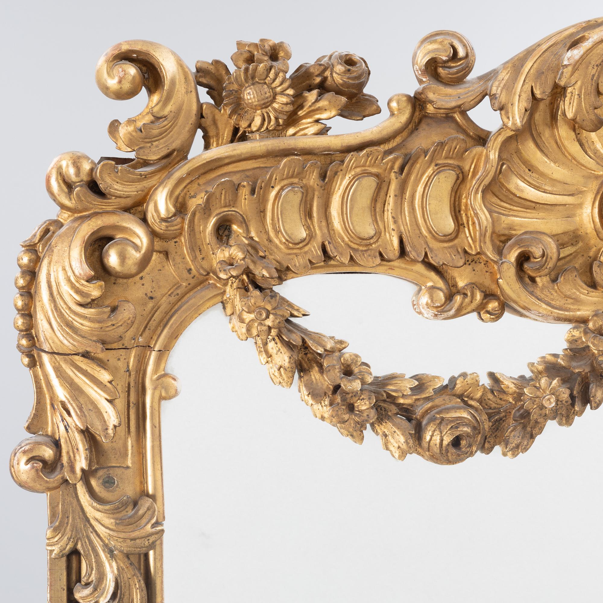 A Rococo style mirror, 19th Century.