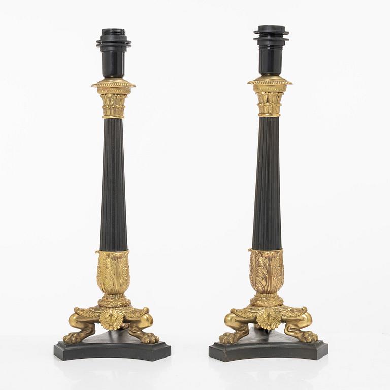 A pair of table lamps/reworked candle sticks, Empire, France, first half of the 20th century.