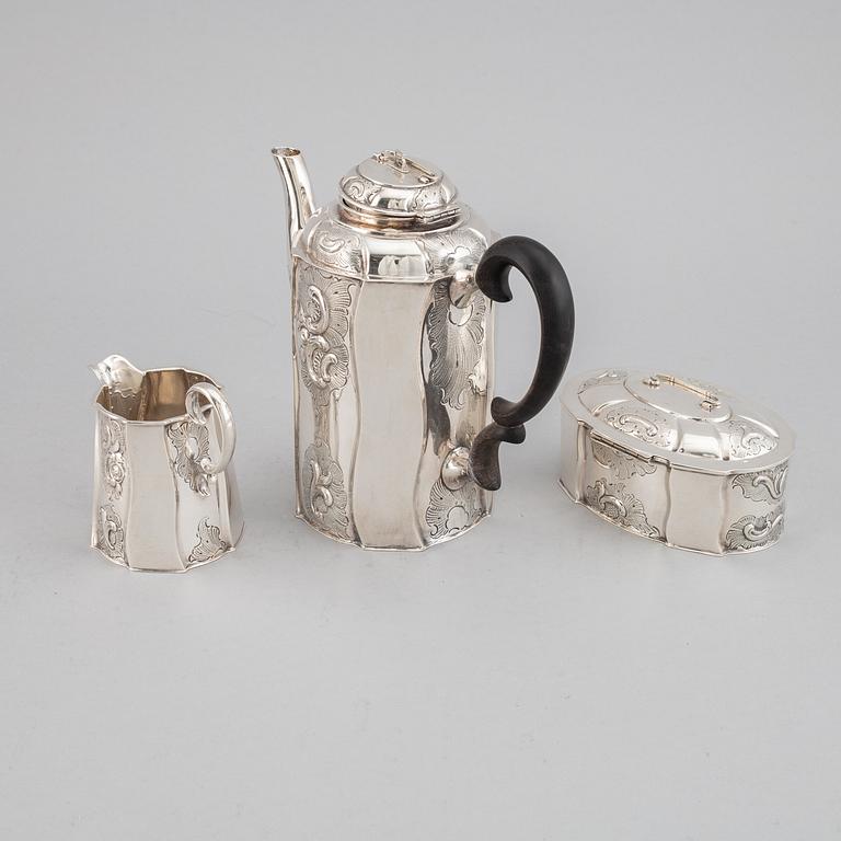 A silver coffee pot, creamer and sugar box. Swedish import mark.