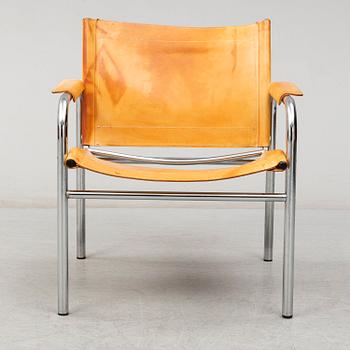 TORD BJÖRKLUND, a 'Klinte' leather and tubular steel easy chair from IKEA, 1970's.