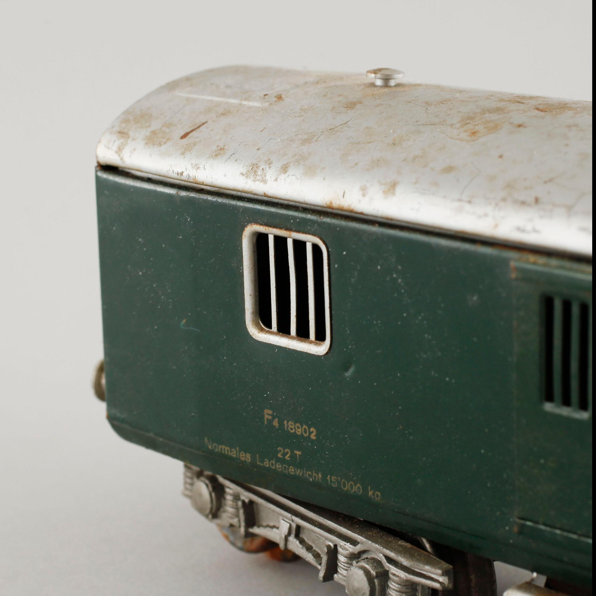 A 1940/50s model train set of 31 pcs in O-scale made by HAG, Switzerland.