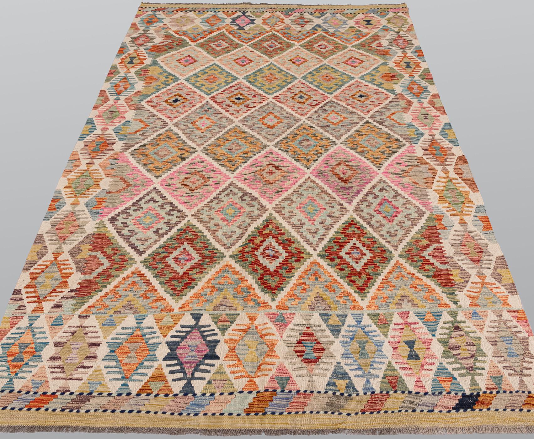 A Kilim rug, approx. 263 x 173 cm.