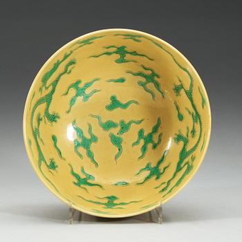 A Chinese yellow glazed dragon bowl, presumably Republic.