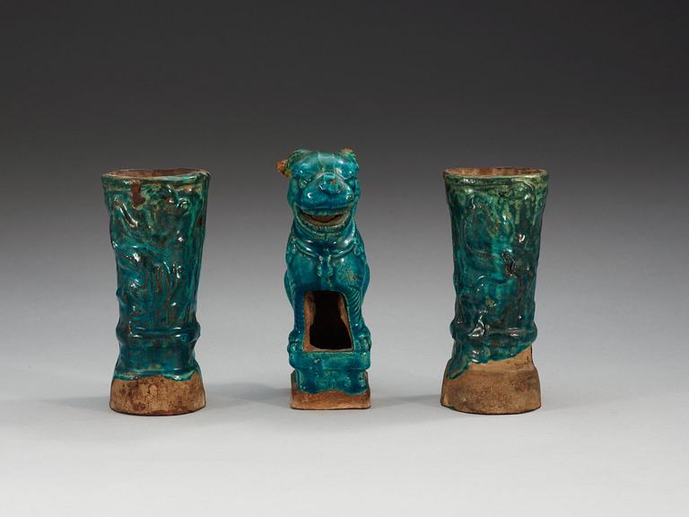 A set of two turquoise glazed altar vases and a Buddhist lion, Ming dynasty (1368-1644).