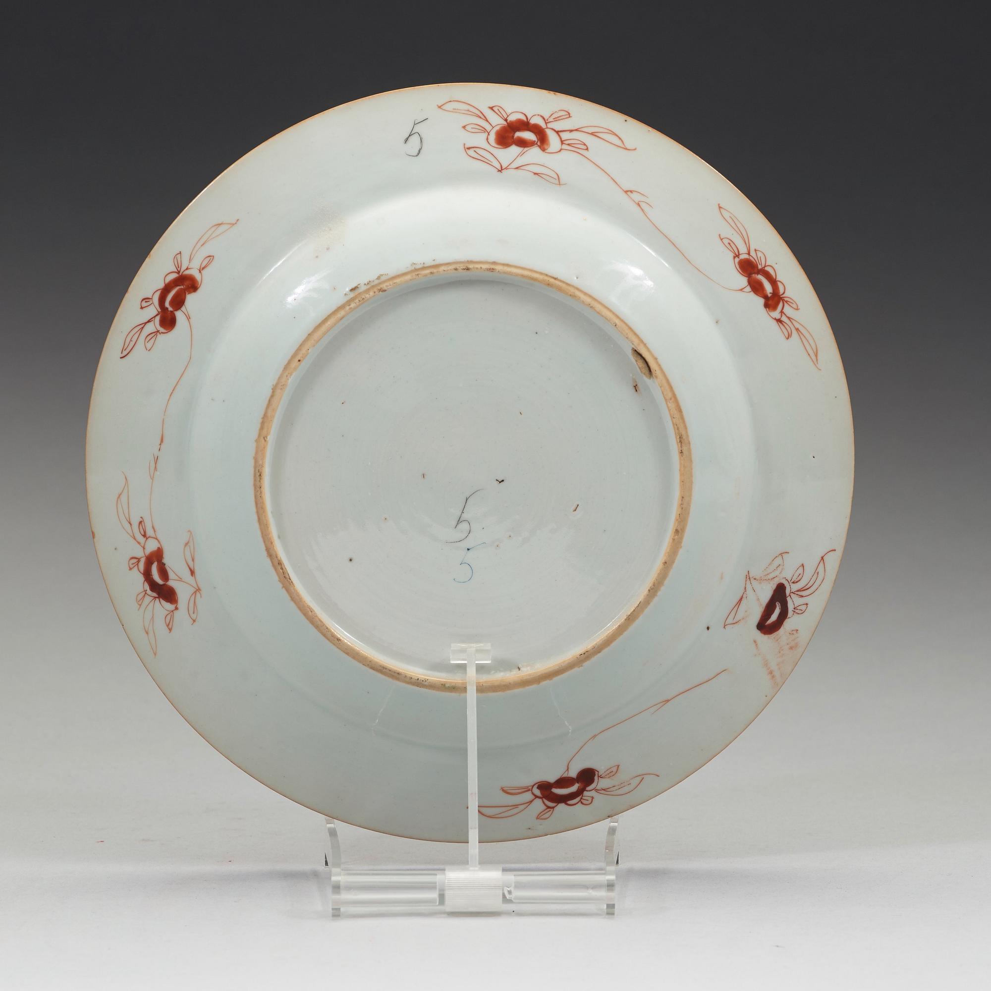 An export porcelain 'Pompadour' armorial plate, Qing Dynasty, circa 1745.