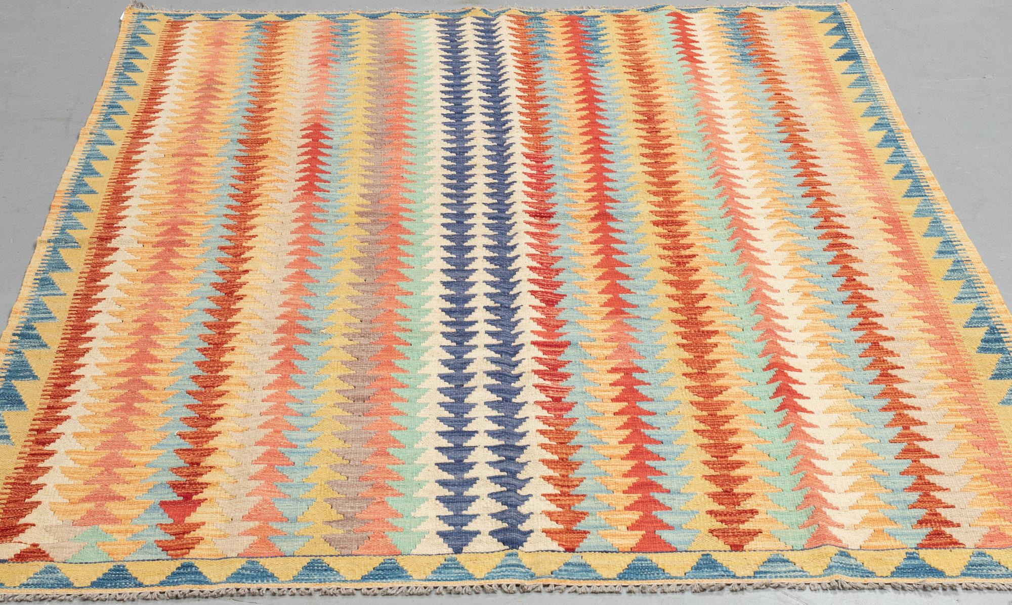 A rug, kilim, ca 247 x 171 cm.