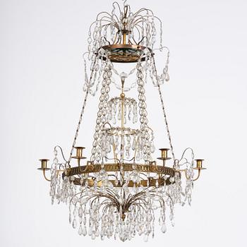 A Late gustavian green top glass six light chandelier.