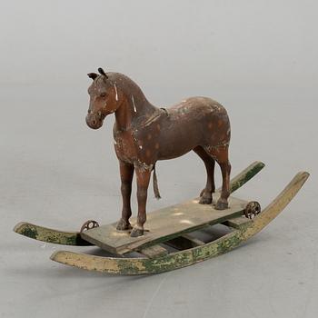 A ROCKING HORSE, 20th century.