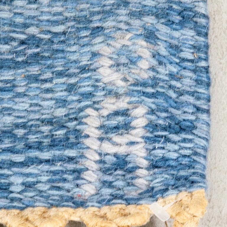 Anna-Johanna Ångtröm, a flat weave carpet labeled 234x163 cm.