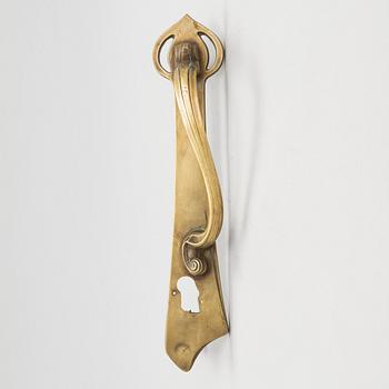 An early 20th century art nouveau doorhandle, France.