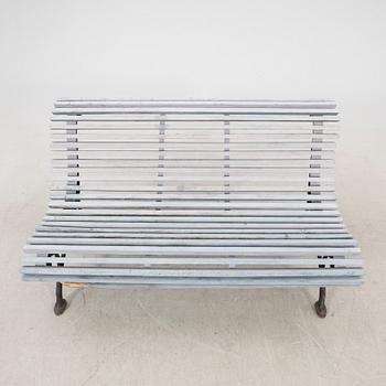 A cast iron early 1900s garden sofa.