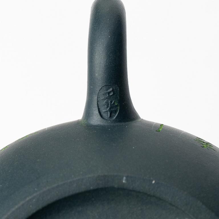 A group of three yixing teapots and a box with cover, China, 1970/80s.