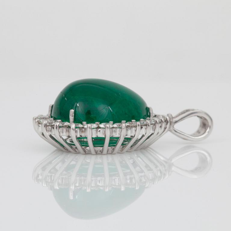 A drop shaped cabochon-cut emerald, circa 14.00 cts, and brilliant-cut diamond pendant.