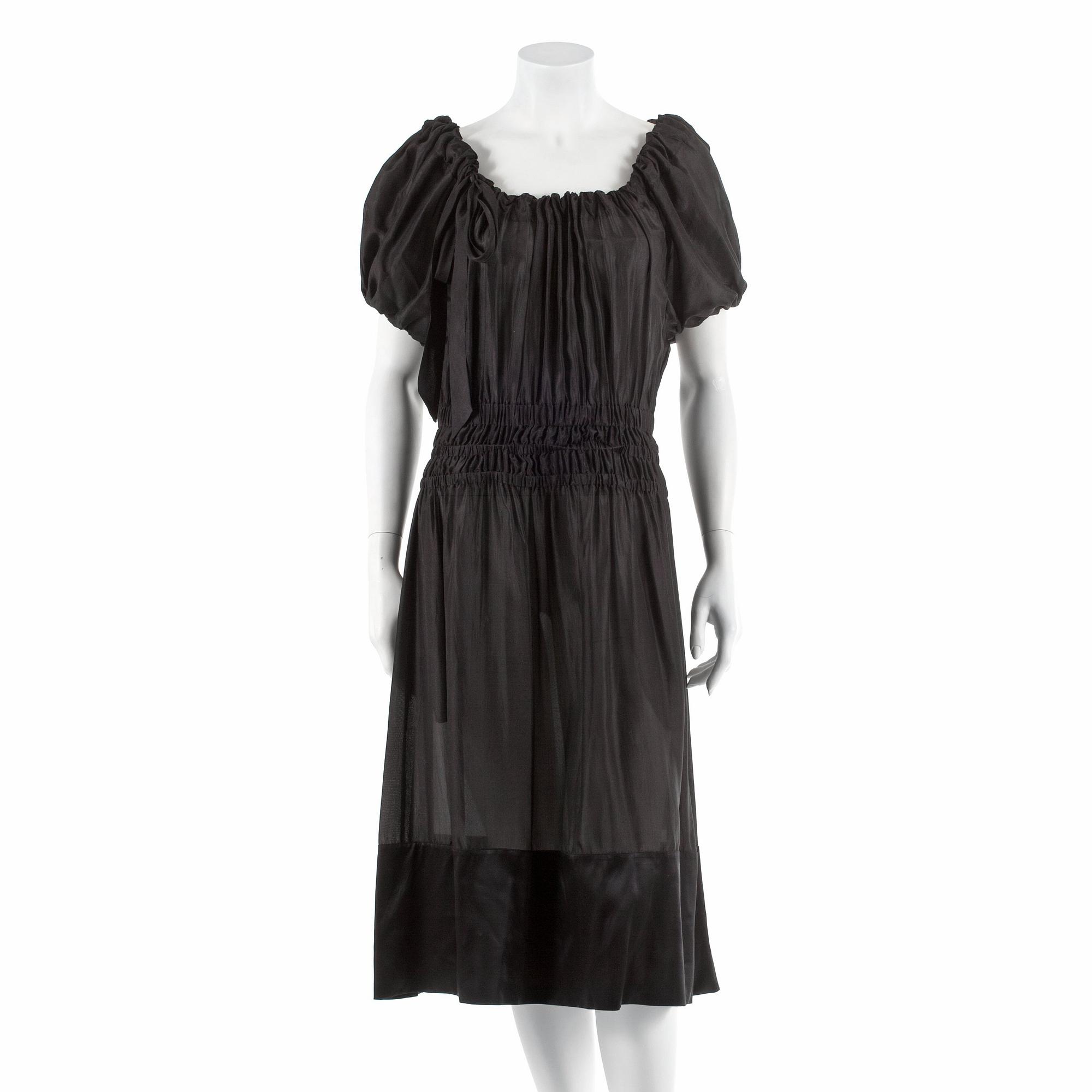 DKNY, a black silk dress. Size M.