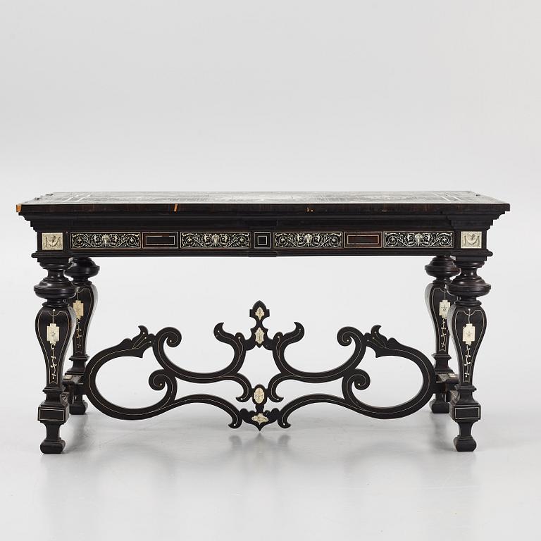 A Renaissance-style ebony, ebonized and ivory-inlaid library table, late 19th century, presumably Germany.