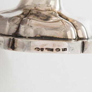 A set of two 1920s-1930s silver sweetmeat basket with sugar tong and jam spoon, Uusi Kultaseppä Oy, Helsinki, Finland.