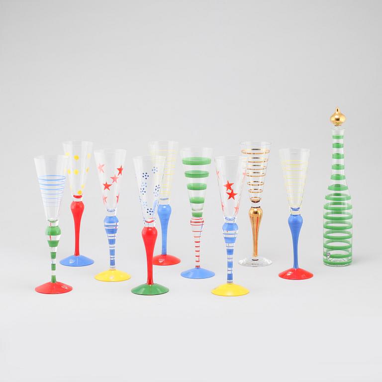 Nine late 20th century champagne glasses and decanter, "Clown", for Orrefors.