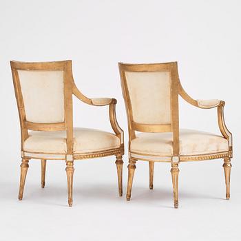 A pair of late Gustavian open armchairs by J. E. Höglander (master in Stockholm 1777-1813).