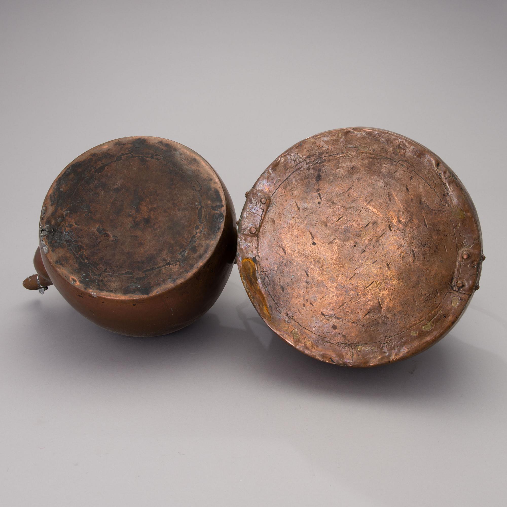 A set of two Finnish copper coffee pots from the middle of the 19th century.