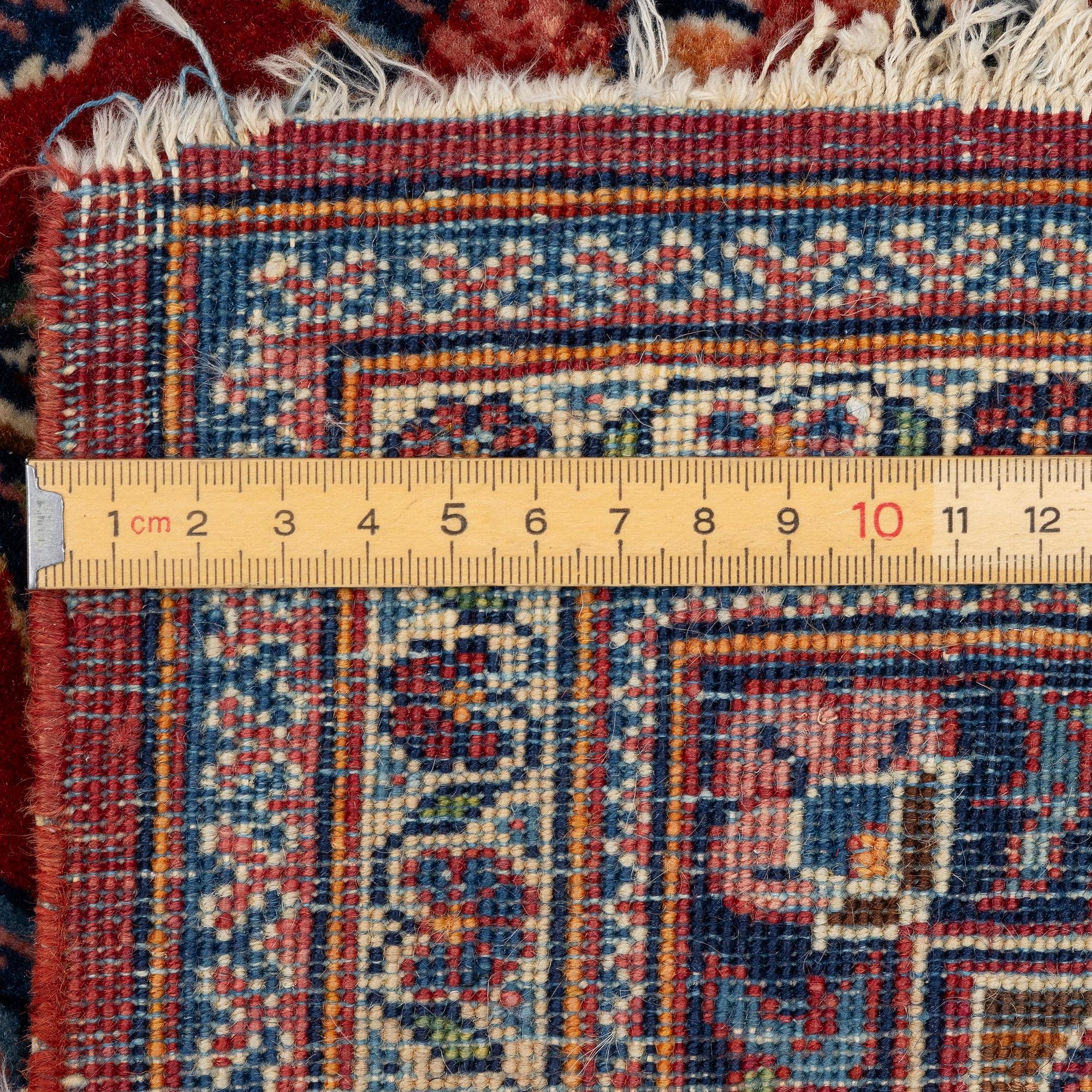 A semi-antique Kashan rug, Central Persia, c. 197 x 136 cm.