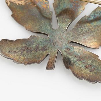 Two silver and enamel brooches, one by David Andersen, Norway.