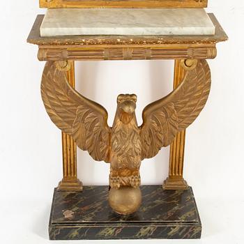 A Swedish Empire Mirror frame and console table, first half of the 19th century.