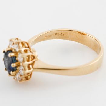 A sapphire and brilliant cut diamond ring.