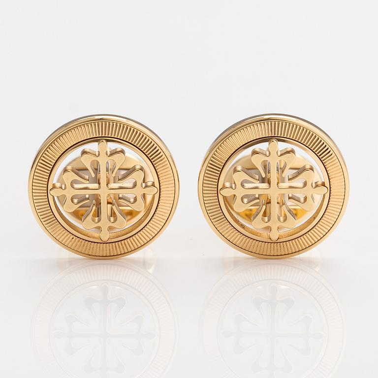 Patek Philippe, A pair of 18K gold "Calatrava" cufflinks. Marked Patek Philippe Geneve.