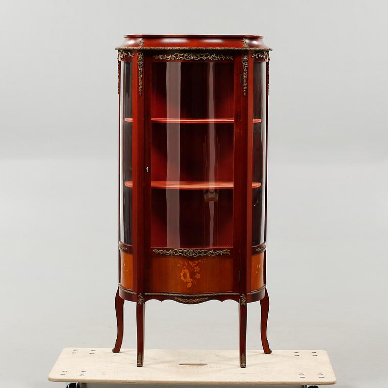 A mid 20th century glass cabinet.