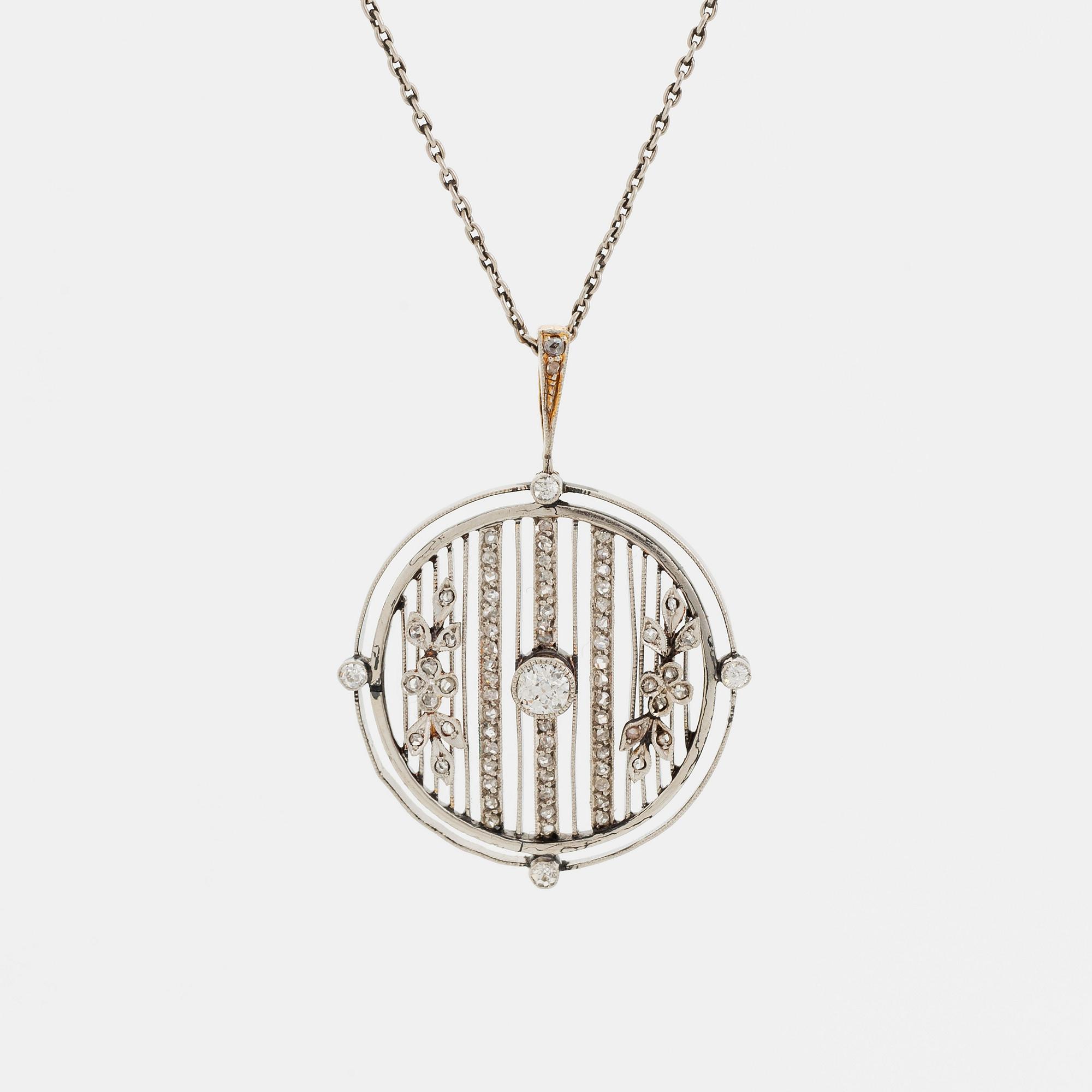 Hänge platina och 14K guld med gammal- och rosenslipade diamanter.