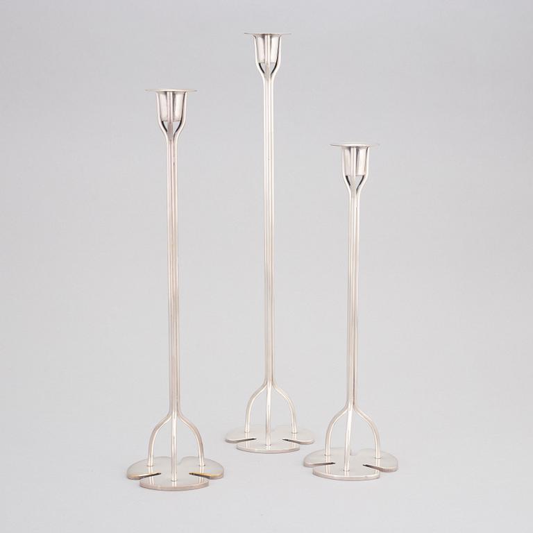 Josef Frank, a set of three silvered brass 'Klöver' candlesticks for Firma Svenskt Tenn, the model designed 1952.