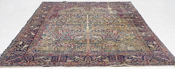 A semi-antique Kerman carpet, c. 325 x 203 cm.