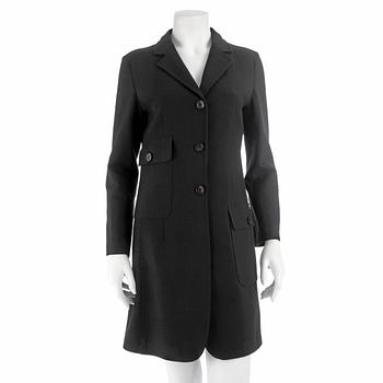 630. MOSCHINO, a black blendmaterial coat from the 1990s. Italian size 42.