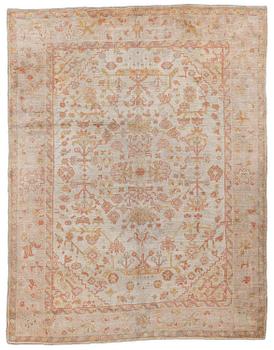An antique Ushak carpet, c. 335 x 259 cm.