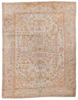 An antique Ushak carpet, c. 335 x 259 cm.