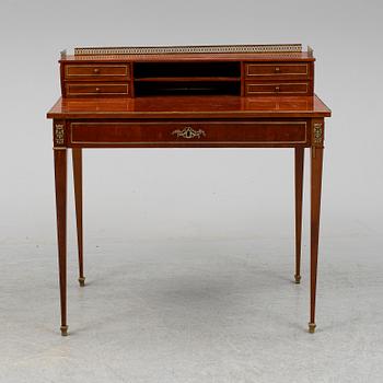 A Louis XVI-style writing desk, 20th ct.