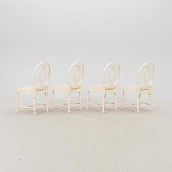 A late 20th century painted Gustavian style 5 pcs dining suit.