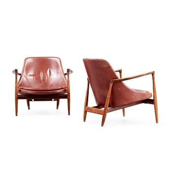 85. A pair of Ib Kofod Larsen palisander and brown leather 'Elisabeth' easy chairs, Denmark 1950's-60's.