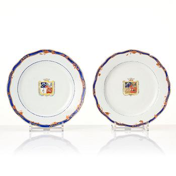 A set of 8 Chinese Export armorial dinner plates, Qing dynasty, 1790's.