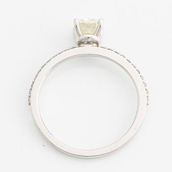 Ring with cushion-cut yellow diamond.