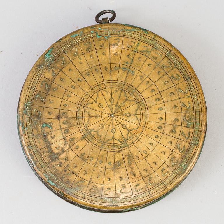 A 18th century bronze sundial.