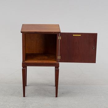 A mahogany bedside cabinet by Carl Johanssons Möbleringsaffär, around the year 1900.