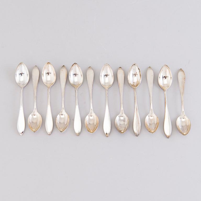 A 1920s 88-piece set of silver cutlery and 12 knife handles, Warsaw Poland.