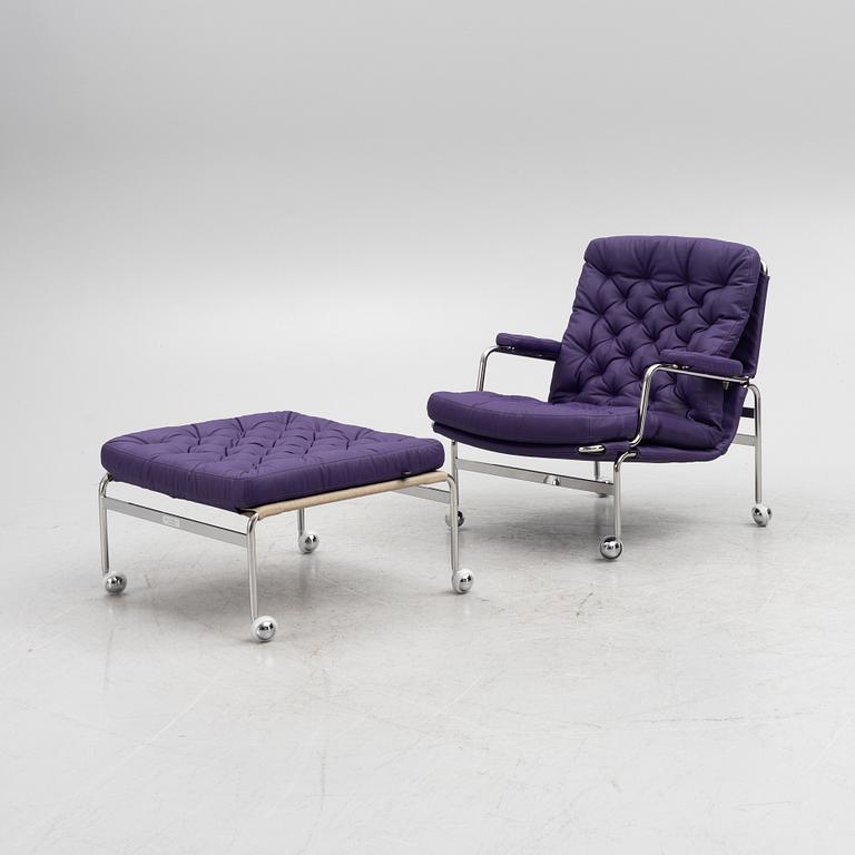 Bruno Mathsson, a limited edition of 'Karin 73' leather upholstered easy chair with footstool, from Dux, Released 2022.