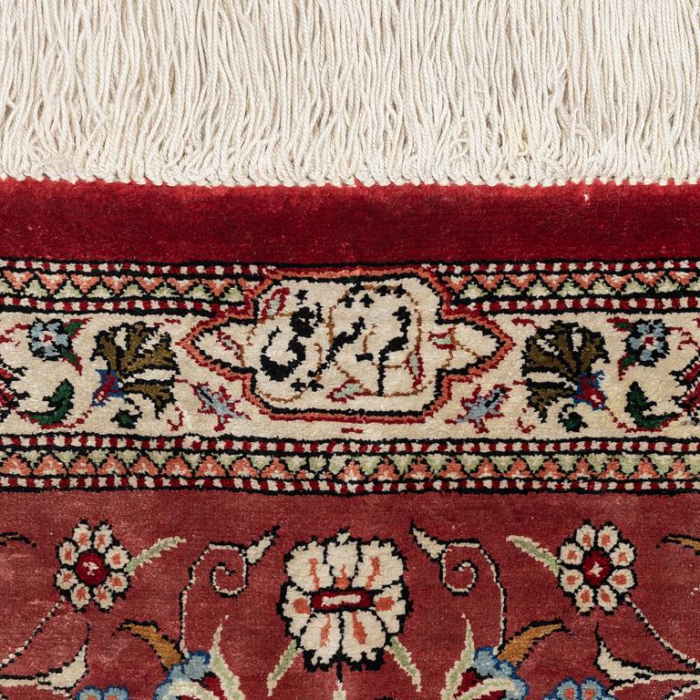 A silk Qum, rug Central Persia (Iran), signerad c. 200 x 135 cm.
