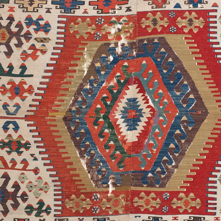 An antique Anatolian kilim, ca 324 x 169 cm.
