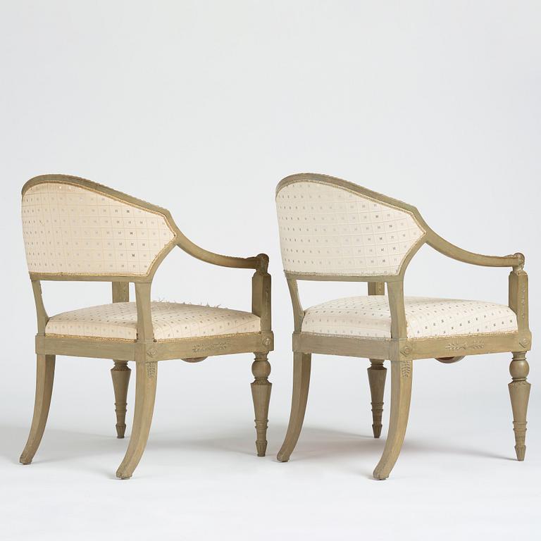 A pair of Late gustavian armchairs.